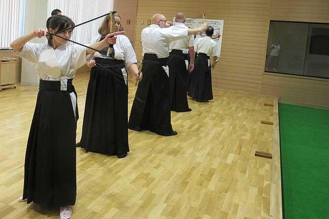 Authentic Kyudo Japanese Archery Experience in Tokyo - Getting dressed in dōgi: gloves, uniform fit, and bow setup