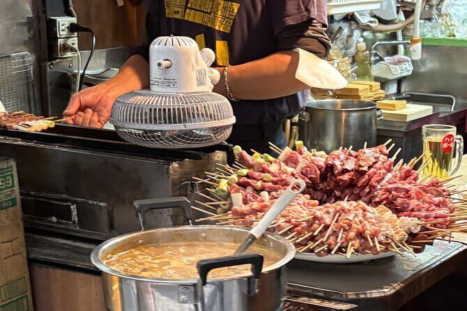 Shinjuku: Food Tour – 15 Dishes & 3 Drinks at 4 Eateries - Stop 2: Kabukicho’s local-leaning izakaya—food first, scene second