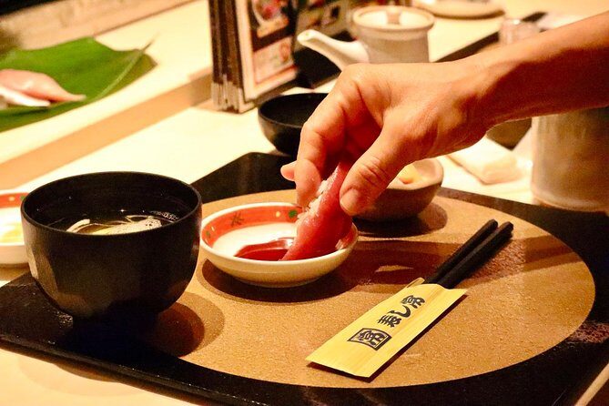 Tokyo: Food Tour in Ueno with 10+ Tastings of Japanese Classics - Market stop: where Japanese snacks meet gift-shopping energy